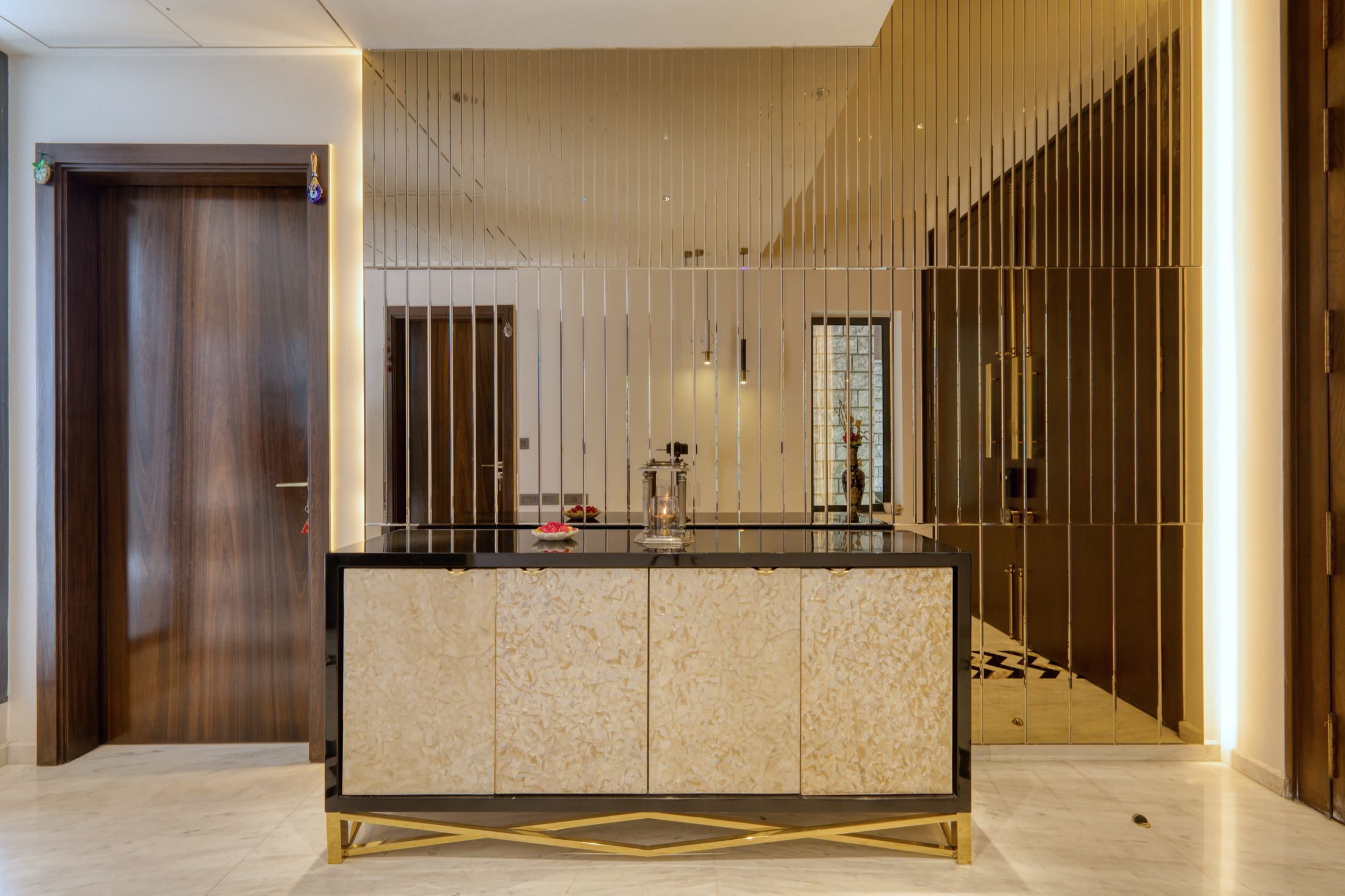 Modi Villa foyer bar with gold mirror panelling