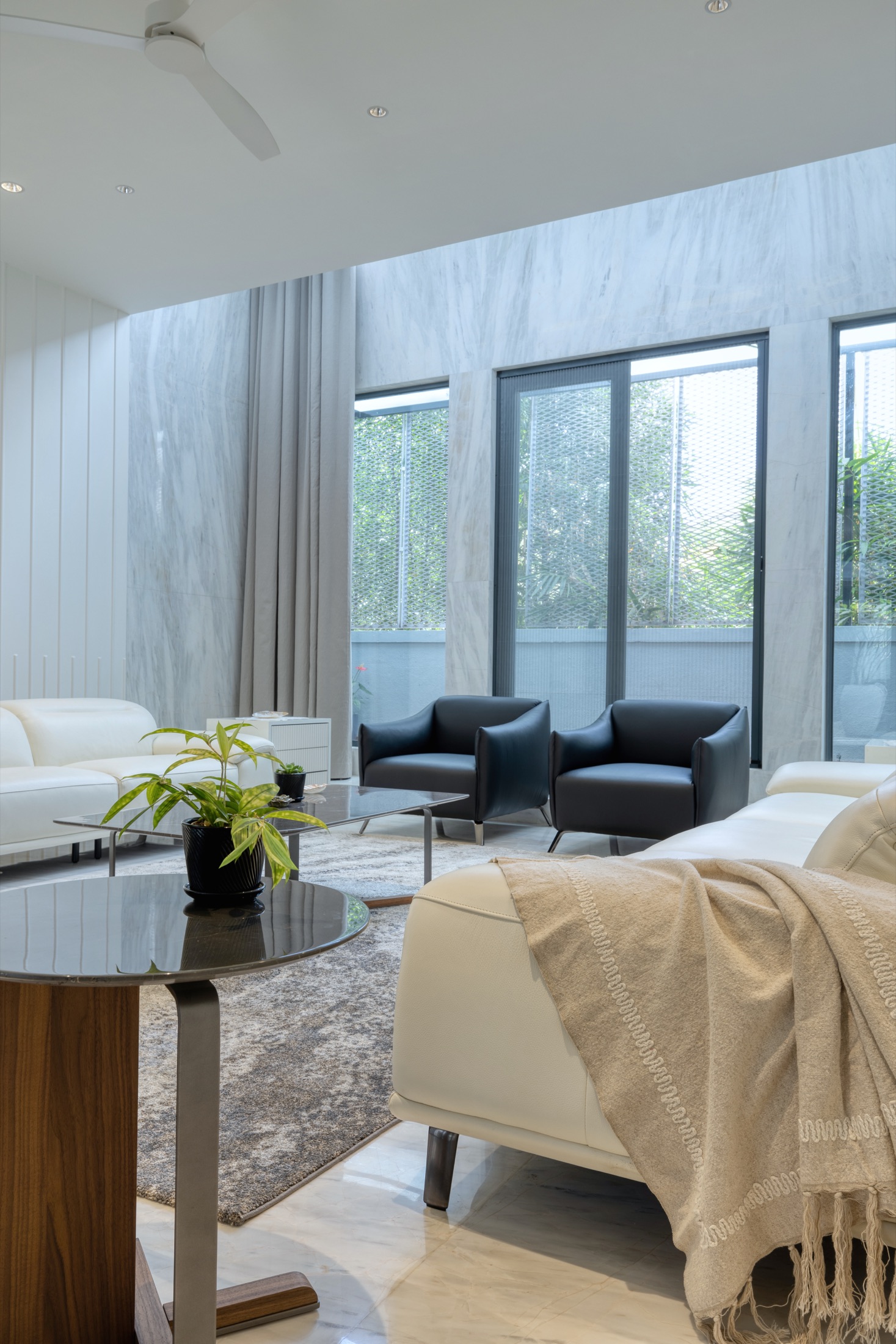 Modi Villa living room opening to a private balcony